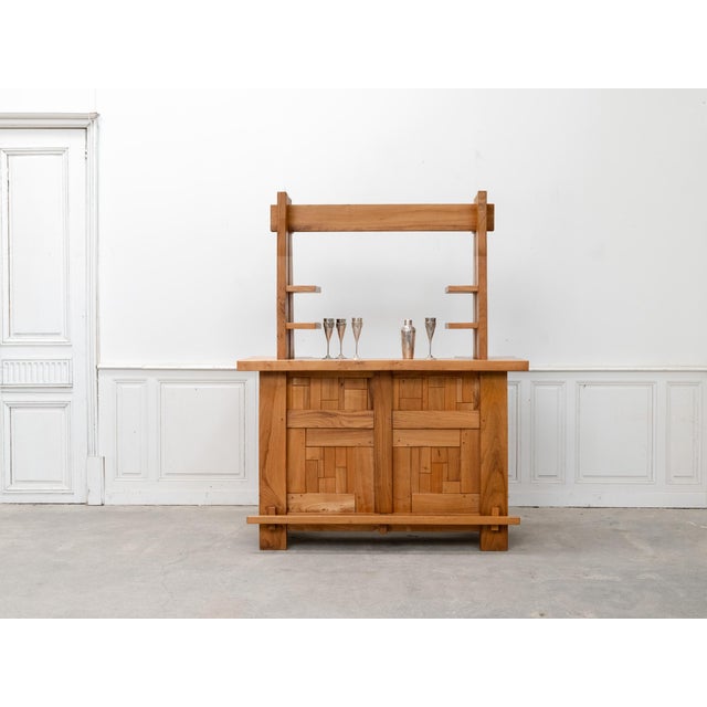 with its typical 1960s design and solid elm construction, this vintage bar is as elegant as it is inviting. Its clean...