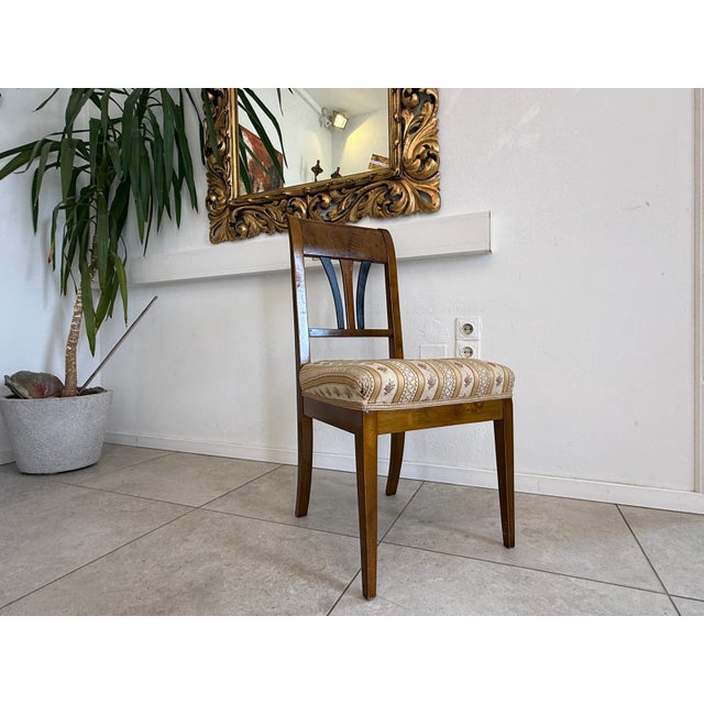 Biedermeier Armchair, Walnut Wood, Dimensions: Height x Width x Depth 90 x 45 x 43 cm. For sale is an exquisite...