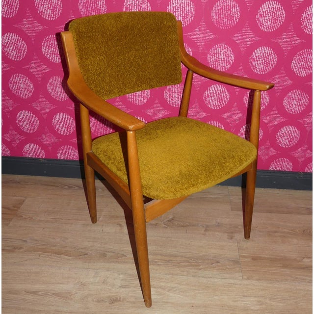 Particularly elegant, comfortable chair, 1960s comfortable padded seat and backrest. Finely shaped beech wood frame,...