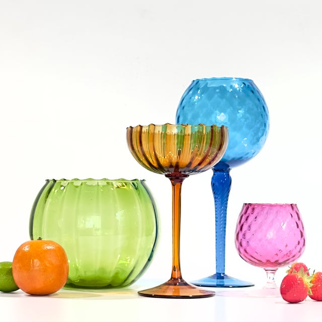 This stunning collection showcases mid-century modern Italian art glass from the renowned region of Empoli, Italy. Known...