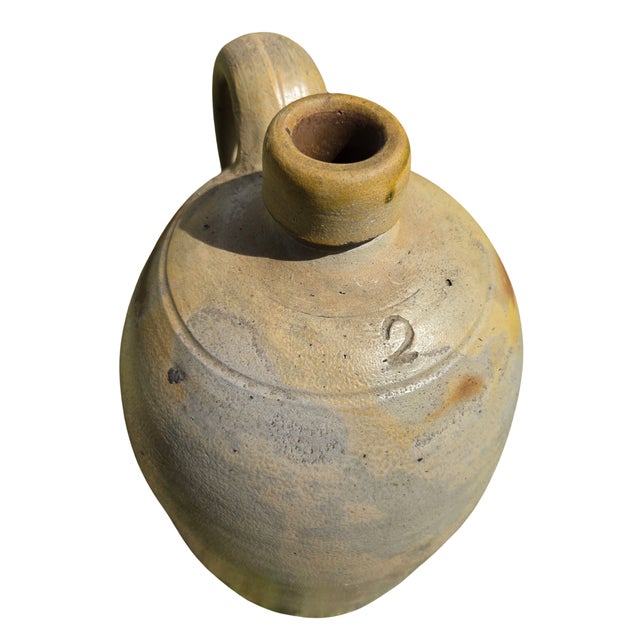 19th century American salt-glazed stoneware jug with classic ovoid form and incised “2” gallon capacity mark. Primitive...