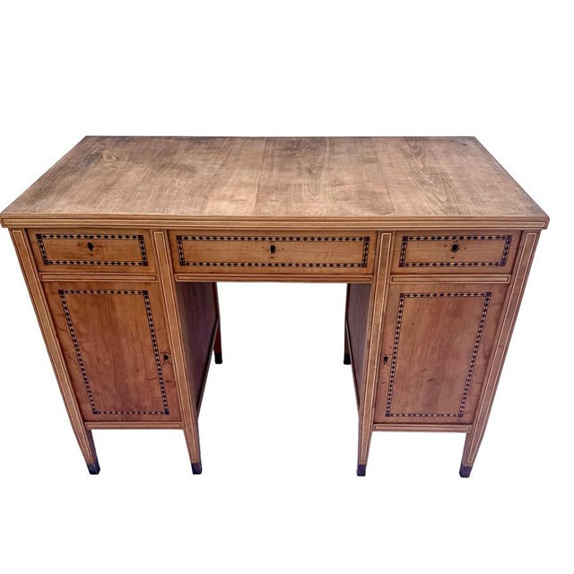 German Jugendstil writing desk attributed to Bruno Paul, circa 1900. The desk is executed in solid wood with finely...