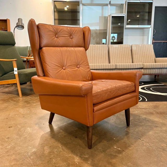 Vintage mid-century Danish modern caramel cognac leather lounge chair designed by Svend Skipper for Skipper Møbelfabrik,...