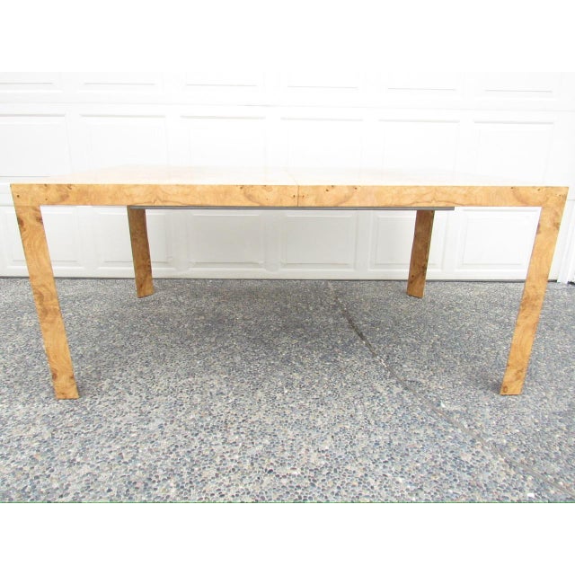 Vintage burl walnut extendable dining table by Edward Wormley for Dunbar, c.1970’s This dining table has a striking book...