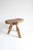 A brutalist handcarved wooden tripod stool from the 1950s-1960s. The bottom of the stool as well as the legs have intact...