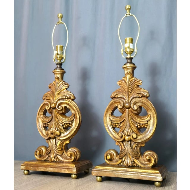 Matched pair of table lamps by John Richard, both retain original labels on sockets and on the bottom. Ornate cast bases...
