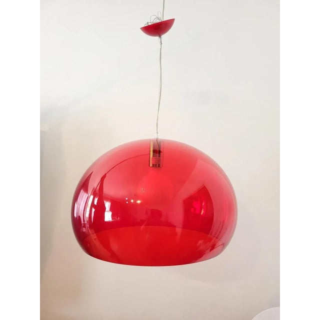The iconic Kartell pendant light, designed by Ferruccio Laviani in Italy, embodies the elegance and innovation of...