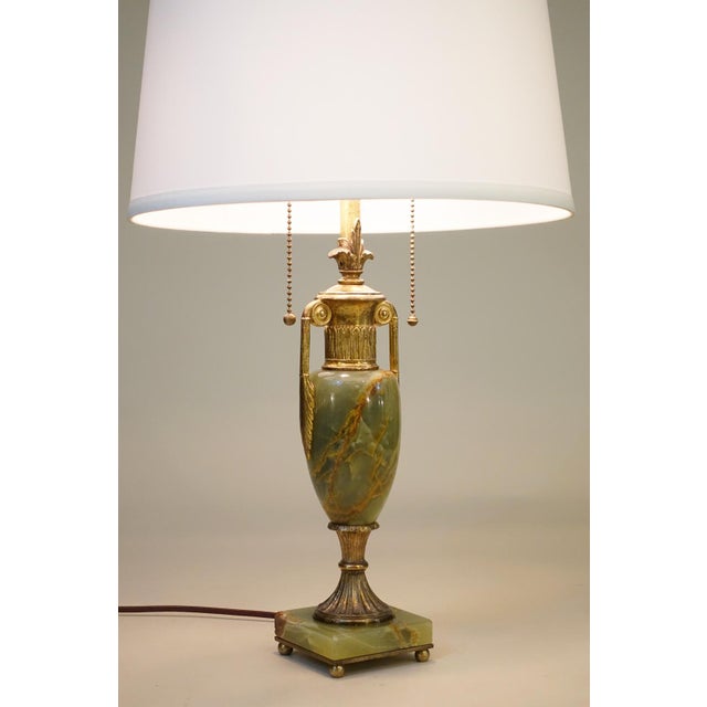 A sophisticated and elaborately detailed Green & Rust Onyx Marble & patina'd Gilt Brass French Empire Neoclassical table...