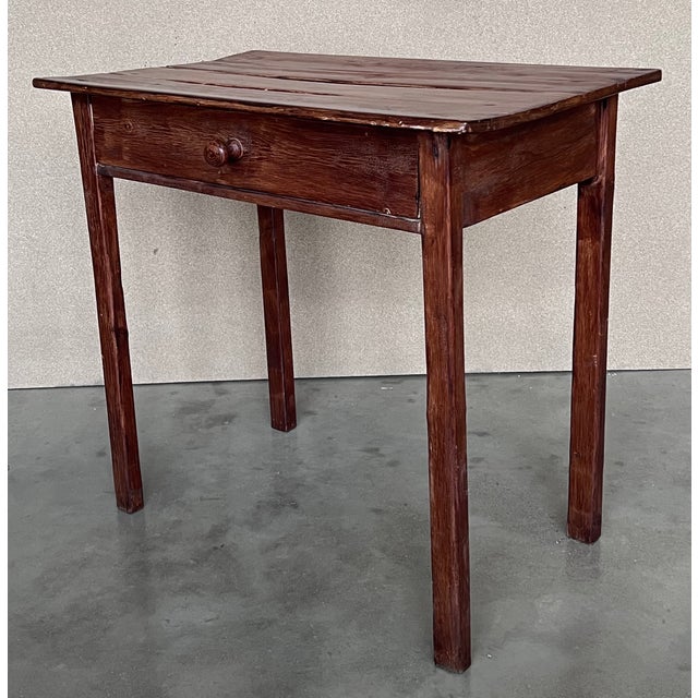 Spanish Country side table with drawer. Made of antique pine called "mobila", this table is very functional and you can...