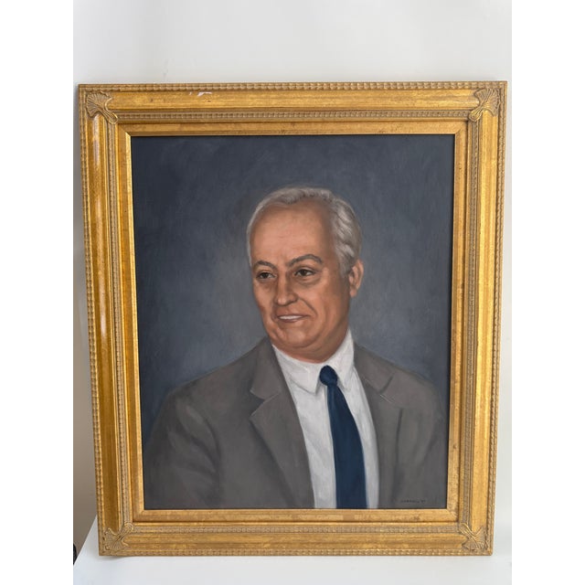 Vintage Gentleman portrait painting of man wearing a suit displayed in gold-tone frame. Signed lower right. Hanging...