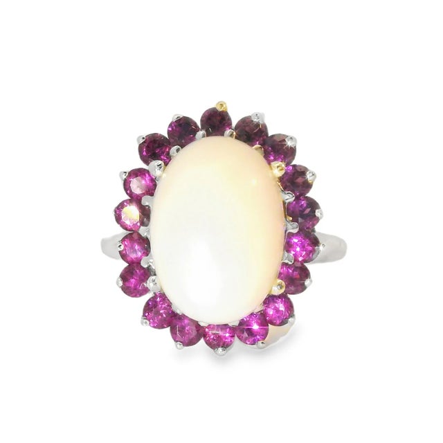 Add a touch of color and sophistication to your collection with this exquisite 14K White Gold Rhodolite Garnet and Opal...