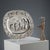 Embossed, chased, and burin-worked silver tray. At the center is a scene of a festive procession. The brim features a...