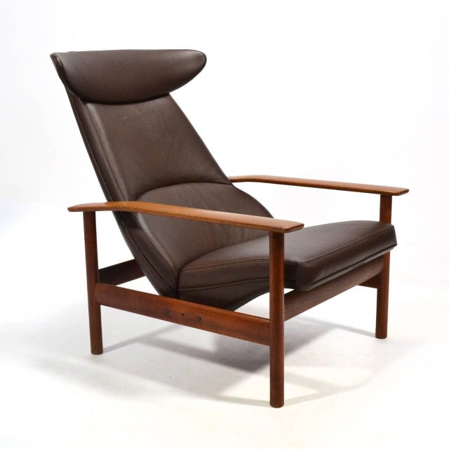 This exceptional lounge chair by Sven Ivar Dysthe for Dokka Mobler is a handsome, powerful design. With a frame of solid...