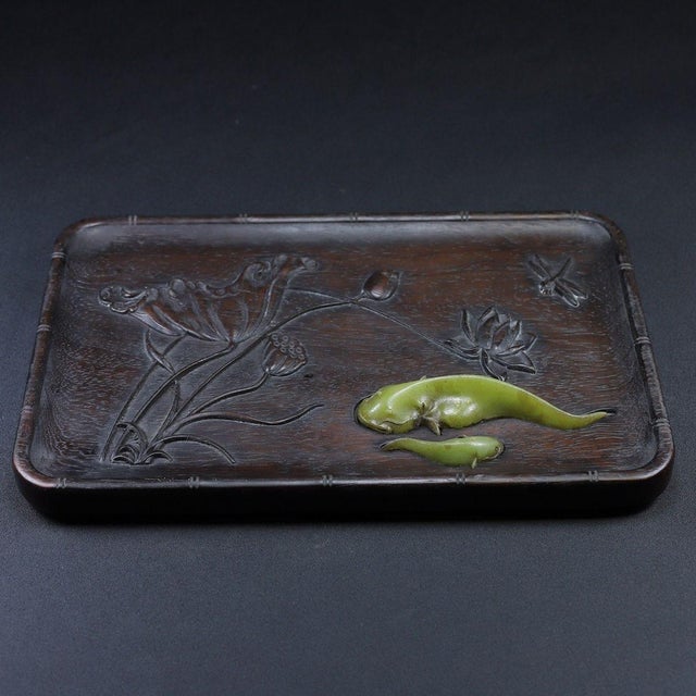 This elegant Chinese red Huali wood tray is a beautifully handcrafted piece featuring exquisite jade inlay in a...