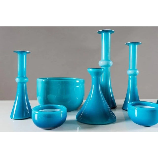This collection of glass vases and bowls was designed by Per Lutken for Holmegaard, Denmark. The collection consists of...