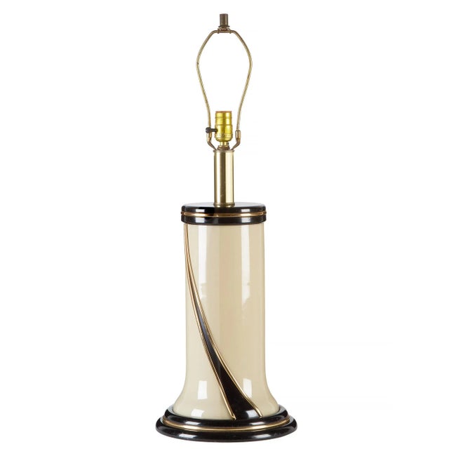 Elegant 1980s lamp with a soft, ivory glass body glows when the interior light (three candelabra base bulbs) is on. Black...