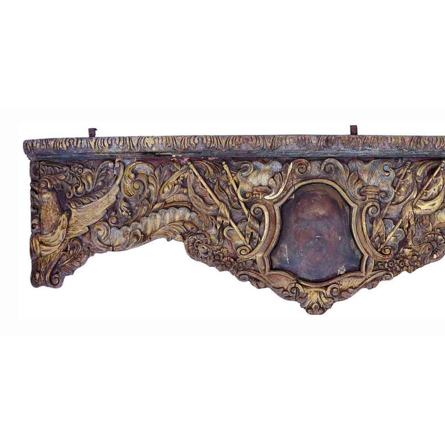 Very special, antique gilt wood carousel panel having masterfully carved rinceau ornament and bird motifs. Central...