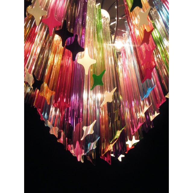 A magnificent murano glass unique chandelier, spiral shape, very elegant, 200 multicolored quadriedri on chrome metal...