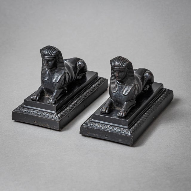 Rare pair of neoclassical paperweights in Berlin iron, dating from the early 19th century. Each finely detailed sphinx is...