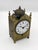 Rare Swiss Capuchin clock from the first half of the 19th century, with a brass case and four turned feet and pinnacles....