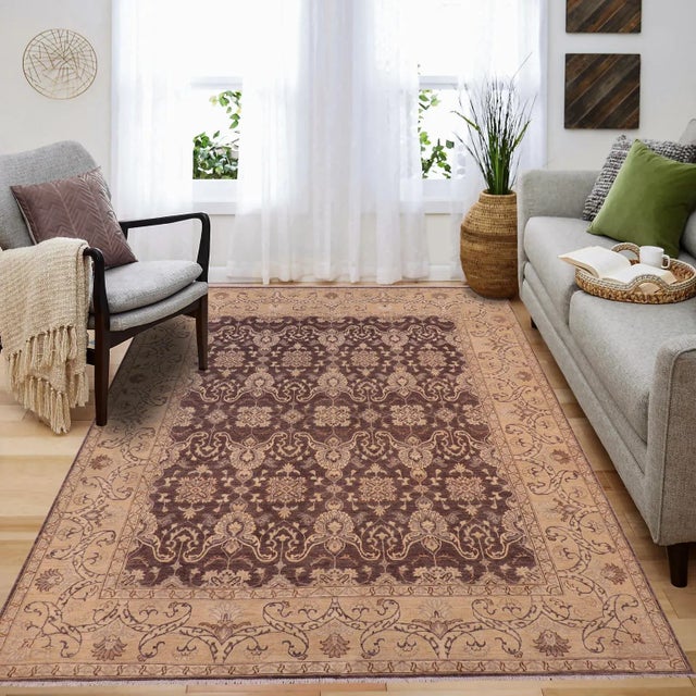 "Enhance the ambiance of your home with this magnificent Persian-influenced Turkish hand-knotted rug made by skilled...