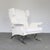 Large armchair from the 1960s in white boulclè fabric (has stains) with chrome-plated metal legs and details.
