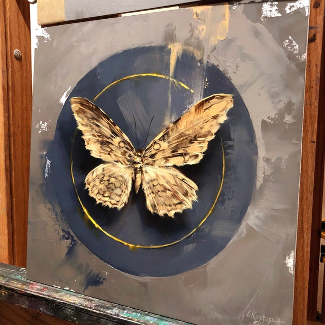 This artwork features a meticulously rendered white witch moth, its delicate wings spread wide against a muted gray...