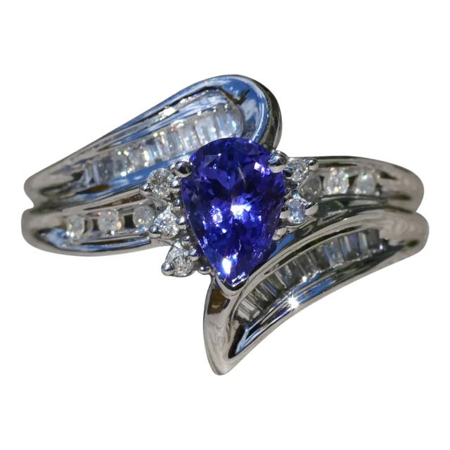 The Artemisia: Ladies Bypass Style White Gold Ring set with 0.75 CT Tanzanite and Side Diamonds For Sale