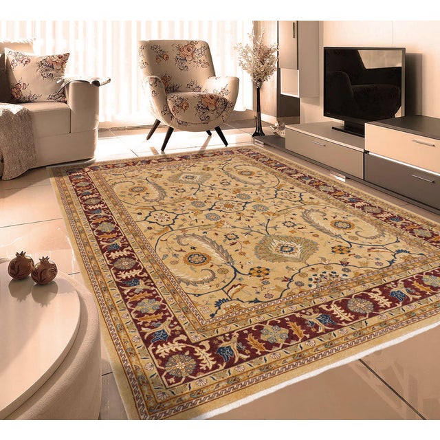 Enhance the ambiance of your home with this magnificent Persian-influenced Turkish hand-knotted rug made by skilled...