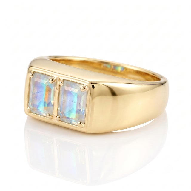 Exude an ethereal yet modern aesthetic with this chunky, polished band featuring two side-by-side step-cut gemstones...