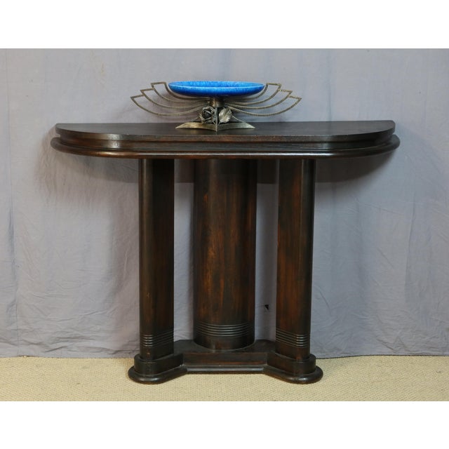 Art Deco console table in stained oak by Maison Chaleyssin in Lyon. DIMENSIONS: 1.31m long, 0.36m deep, and 0.94m high....