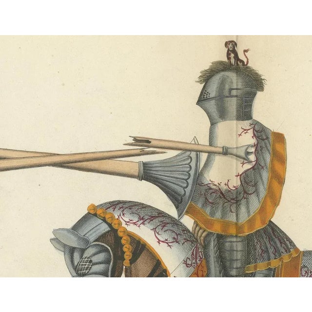 19th-Century Hand-Coloured Knightly Joust: Ornate Armor & Horses in Action This original hand-coloured lithograph,...