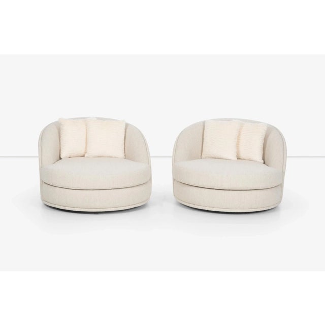 Pair of Milo Baughman Style oversized swivel lounge chairs by Directional, Reupholstered in Italian Boucle. Pillows; Faux...