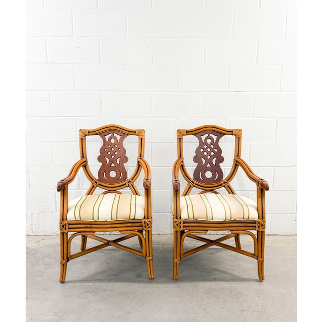 Set of 4 vintage coastal bamboo armchairs in the sought-after Palm Beach style. Crafted by P.T. Fendi Furindo. Made from...