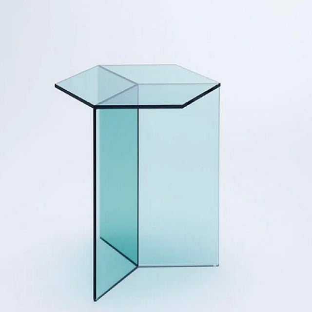 Blue lucite hexagonal side table modern has modern architectural design. Designed with a different perspective, this...