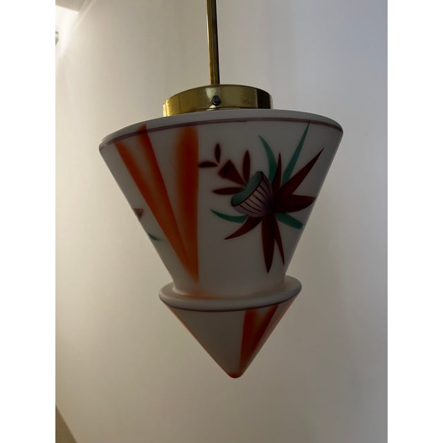 This rare ceiling lamp dates from the Art Deco period and was most likely made in Vienna, Austria. The diamond-shaped...