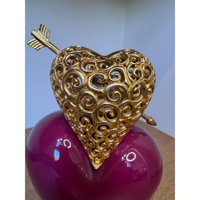 A sculptural “Double Heart” fragrance lamp designed by Régis Dho for Lampe Berger Paris. Crafted in rich crimson Limoges...