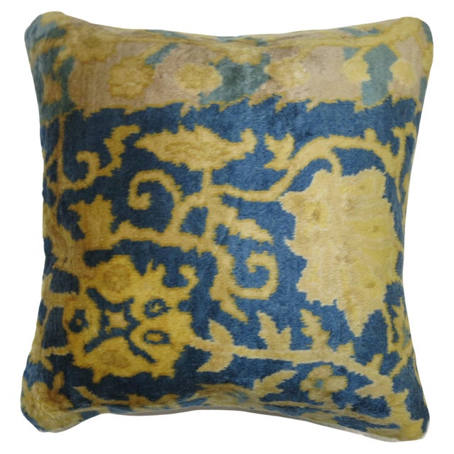Pillow made from a 20th-century Indian larestan rug with silky wool in blues and gold. Measures: 16'' x 16''.