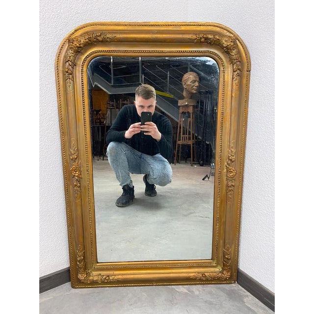 Antique mirror circa 1890 in original condition with signs of usage.