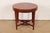 A gorgeous Federal or Regency style carved cherry wood occasional side table or tea table By Baker Furniture, "Milling...