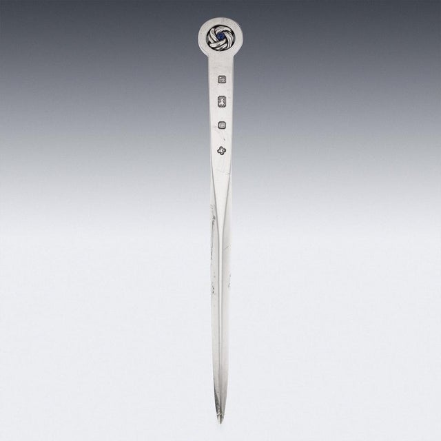 20th Century British solid silver letter opener, terminating with a woven silver decoration mounted with a lapiz cabochon,...