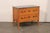 A French wooden two-drawer chest with marble top from the 19th century. This antique chest from France has a rectangular...