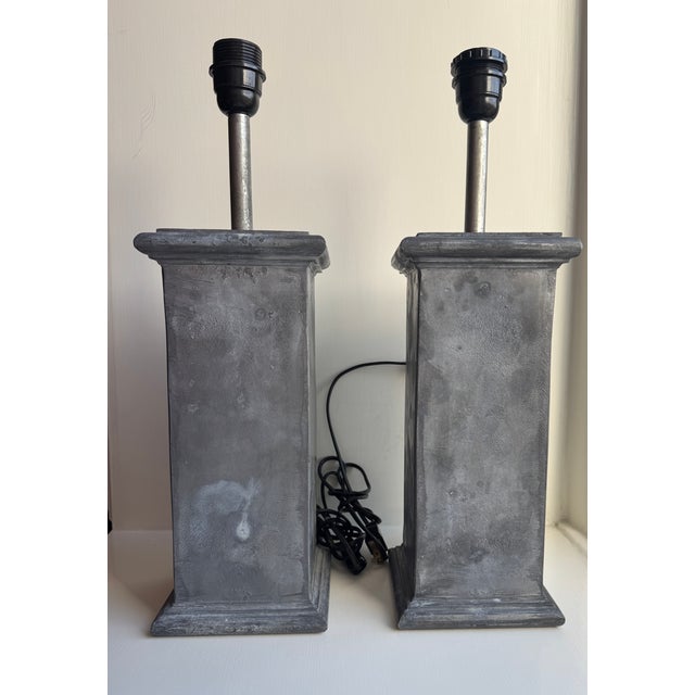 Here for consideration is a truly imposing pair of vintage zinc lamps, with classic architectural columnar form. Very...