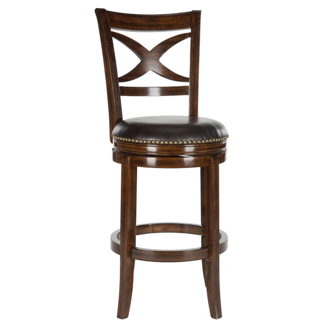 A lavish X-back detail lets the Swivel Barstool provide a open, airy from the kitchen. Upholstered with dark brown PU...