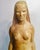 Terra-cotta sculpture of the Earth Mother circa 1950s. Standing full frontal with small drapery at knees, small globe,...