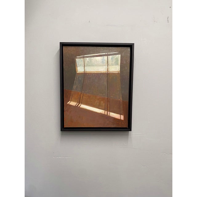 This oil painting captures the soft interplay of light and shadow as it filters through a window, casting gentle...