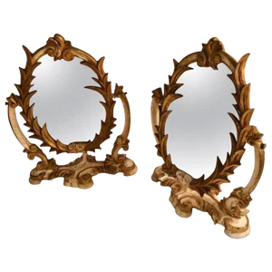 Two Venetian Parcel-Gilt Easel Mirrors