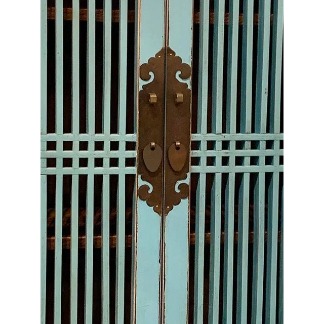 Asian Panel Doors Tall Cabinet is made out of elm wood. It has 5 drawers, 2 doors and 2 removable shelves. It has tons of...