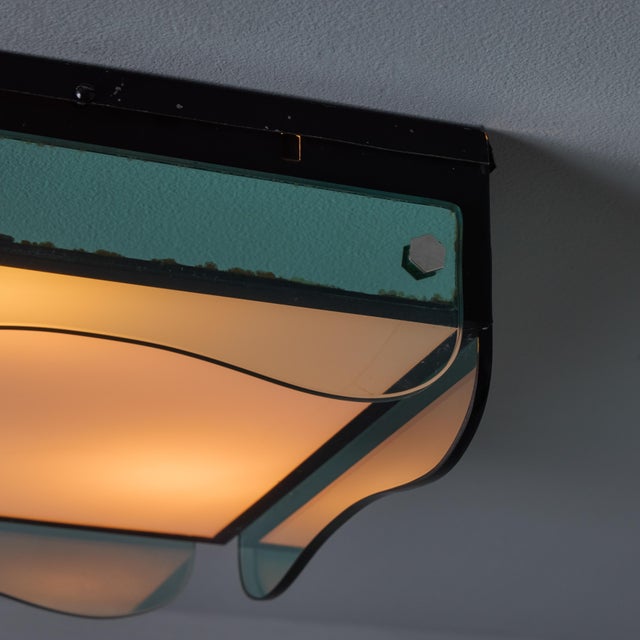 1970s Veca Glass Wall or Ceiling Lamp in the Manner of Max Ingrand Executed in thick green Murano glass on a black metal...
