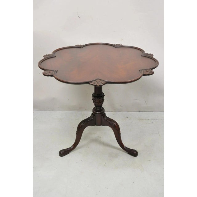 Vintage Crotch Mahogany Chippendale Style Pie Crust Pedestal Base Side Tea Table. Item features carved pedestal base,...